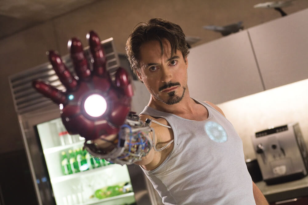 a man holding a red metal hand